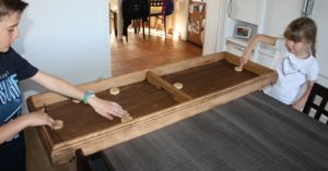 Location jeu en bois, table à élastique à louer